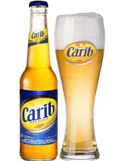 karibisches Bier Carib Premium Lager in der 0,33 l Bierflasche mit vollem Bierglas
